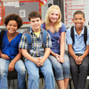 This is a photo of four students sitting together.